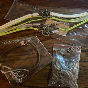 Random lot . Two bracelets and a pack of mermaid charms